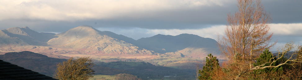 View from Coal Yeat holiday cottages to the Lake District mountains