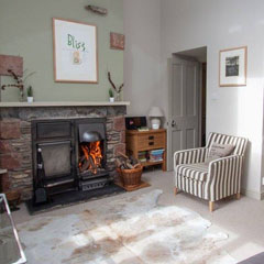 Tethera lounge with open range fire