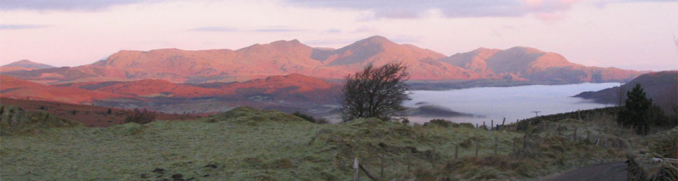 View from Coal Yeat holiday cottages to the Lake District mountains